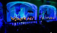 an outdoor area with blue lights and decorations