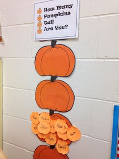 a bulletin board with pumpkins on it