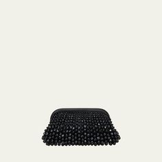 Cult Gaia "Nia" clutch bag in beaded acrylic and leather  Structured top with hinge closure  Lining: Polyester/polyurethane Approx. 6.5"H x 12.5"W x 3"D Imported Cultgaia Bags, Elegant Black Beaded Clutch, Luxury Leather Clutch For On-the-go, Luxury Leather-handled Pouch Clutch, Cult Gaia Clutch, Cult Gaia Bag, Structured Top, Leather Clutch Bag, Cult Gaia