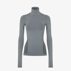 Figure-hugging ski jumper with a high collar and long sleeves. Made of grey tech fabric with seamless construction. Featuring a micro FF pattern and ribbed and mesh inserts for maximum support and comfort. FF detail on the back of the collar. Made in Italy. Size L_xl Functional Winter Tops With Funnel Neck, Functional Funnel Neck Winter Top, Minimal Stretch Winter Turtleneck, Winter High-stretch Turtleneck With Thumbholes, Winter High Stretch Turtleneck With Thumbholes, High Stretch Winter Turtleneck With Thumbholes, Winter Fitted Sportswear Tops, Fitted Winter Sportswear Tops, Fitted Sportswear Tops For Winter