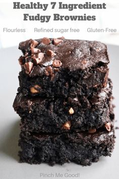 three chocolate brownies stacked on top of each other