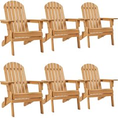 four wooden lawn chairs sitting next to each other