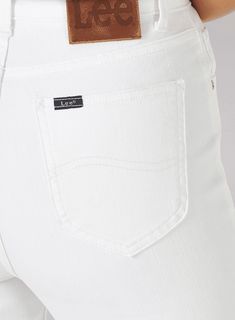 DESCRIPTION:The classic go-to spring and summer five-pocket white skinny jeans. The style for an understated weekend look by pairing a crisp shirt, belt, and pumps, loafters or cute sandals. To transition into Fall, pair with a chunky sweater and knee-high boots for a casual look or dress up with a light turtleneck, blazer and booties. Color: White Content: Self 100% Cotton / Lining 100% Polyester Zip fly with button closure Five-pocket style Model is wearing a size 26 Made in Bangladesh ABOUT T Turtleneck Blazer, Cute Sandals, Lee Jeans, Chunky Sweater, Pocket Jeans, High Boots, Knee High Boots, White Jeans, Knee High