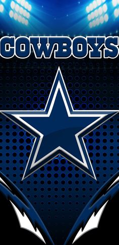 the cowboys logo on a football field with blue lights and spotlights in the background