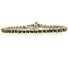 This absolutely stunning 2 ct. t.w. genuine black diamond bracelet in sterling silver is the perfect finishing touch for a romantic evening look. Turn heads as you saunter down the street while the jaw-dropping, genuine black diamonds bring out a dazzling shine, adding just the right amount of bling. This lovely bracelet will sparkle endlessly in the moonlight, showcasing each gorgeous diamond. Be ready to add undeniable glamour to your evening look with this basic yet brilliant wrist piece.Black diamonds are denser and weigh more than white diamonds. Therefore, black diamonds may appear substantially smaller than white diamonds of the same carat size. Size: One Size.  Color: Gold.  Gender: female.  Age Group: adult. Elegant Black Diamond Bracelet, Elegant Black Diamond Round Bracelets, Elegant Black Diamond Round Bracelet, Elegant Black Diamond Jewelry For Anniversary, Elegant Bracelet With Black Diamonds, Luxury Black Diamond Bracelet With Round Shape, Elegant Jewelry With Round Cut Black Diamonds, Classic Tennis Bracelet With Black Diamonds, Classic Round Black Diamond Bracelet