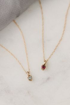 A sparkling gemstone marks the month you are born, a dainty piece of magic shining brightly over everything you do. But not only limited to birth months, these dainty gemstone pendant necklaces can also mark a special anniversary or a month you want to remember for a lifetime. Delicate and precious, this 14k gold birthstone pendant necklace will remind you that the future is yours. Details: -14k, yellow, rose or white gold-Finish: polished-1 sparkling, 2mm responsibly sourced gemstone of your ch Sculpted Jewelry, 14th Anniversary, 16th Anniversary, October Birthstone Jewelry, Solid Gold Chains, Jewelry Lookbook, Birthstone Pendant, Diamond Anniversary, Birthstone Earring