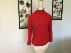 "Vintage red turtleneck by Max Hurni, Made in Switzerland. 100% Nylon. Vest being sold separately. Measurements: 40\" bust; 37\" mid body; 36\" hemline; 25\" tall; 17\" shoulder to shoulder; 22 1/2\" long sleeves. Thanks for stopping by my Etsy store!" Red Fitted Turtleneck Top, Red Turtleneck Workwear Top, Red Turtleneck Tops For Work, Straw Bucket Hat, Brady Bunch, Red Gloves, Red Turtleneck, Bride Dolls, Plastic Doll