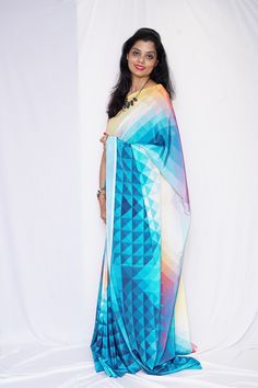 This Beautiful Geometric design Saree is digitally printed on Crepe material. Its a Pure Party & Office wear saree. Material - Crepe Material Blouse - Unstitched Blouse Maroon Color 80CM Length - 6.5 meters Design Digital Printed Dry Clean Only Sarees are made to order; takes 12 days to initiate shipment from order date. Also undertake custom-made digitally printed sarees as per the customers ideas and brief. We design & print our sarees & ship it to customers on pre-order basis. Blouse worn by Festive Multicolor Unstitched Pre-draped Saree, Multicolor Digital Print Pre-draped Saree For Diwali, Multicolor Art Silk Pre-draped Saree, Party Pre-draped Multicolor Saree With Printed Motifs, Party Multicolor Pre-draped Saree With Printed Motifs, Fusion Style Multicolor Silk Pre-draped Saree, Festive Multicolor Digital Prints In Georgette, Multicolor Georgette Blouse Piece With Digital Print, Multicolor Digital Print Dupatta For Party