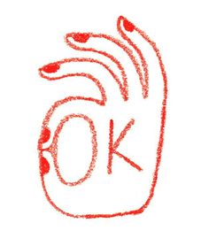 the word ok written in red crayons on a white background