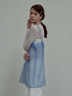 This is a modern and feminine dress by SIEERING that is made out of high quality and sturdy material. With distinctive mood of the design and comfortable wear, you can style it for your casual daily outfit.- Sheer texture of organza fabric- Adjustable shoulder strap- Feminine and romantic mood Chic Blue Organza Dress, Sheer Blue Mini Dress For Spring, Blue Sheer Mini Dress For Spring, Spring Daywear Organza Dress, Spring Organza Dress For Daywear, Blue Sheer Daywear Dresses, Blue Sheer Dress For Daywear, Light Blue Sheer Dress For Daywear, Sheer Blue Dress