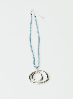 Necklace 50% polyester 40% zinc 10% steel Fabric chain Silver toned pendant Lobster clasp fastening Length adjusts from: 44cm - 52cm / 17.3in - 20.4in Modern Silver Necklace With Adjustable Cord, Silver Long Necklace With Adjustable Cord, Adjustable Metal Snake Chain Necklaces, Adjustable Metal Necklace With Cord, Modern Blue Metal Necklaces, Modern Blue Metal Necklace, Blue Necklaces With Adjustable Cord, Adjustable Blue Chain Necklace, Blue Metal Pendant Chain Necklace