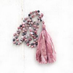 "Porcelain Jasper, Rose Quartz and Rhodonite - Mala For Universal Love - 108 Beads - Hand Knotted - 8mm Length Approx. 39\" - 6mm Length Approx. 30\" A Mala necklace to bring happiness and is also soothing to the soul. Made with Porcelain Jasper, known for strengthening the energy of the emotional body, which eases stress and produces calm. Rhodonite to soothe the nervous system and promote relaxations and Rose Quartz for self-love. This Mala is all hand knotted for beauty and flexibility. A lar Pink Spiritual Necklace With Faceted Beads, Bohemian Pink Beaded Necklaces For Gifts, Pink Hand-strung Necklace As Gift, Pink Hand-strung Necklace For Gift, Pink Bohemian Beaded Necklaces For Gifts, Pink 8mm Bohemian Beads, Pink Meditation Necklaces With Round Beads, Spiritual Pink Hand-strung Necklace, Pink Round Beads Necklace For Meditation