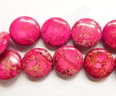 pink and gold marble beads on white background