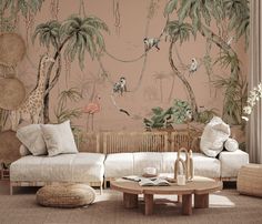 the living room is decorated with tropical wallpaper