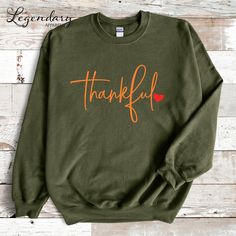 Thankful Sweatshirt Thanksgiving Day Sweater Cute Grateful Turkey Day Sweatshirt Women's Thanksgiving Outfit Positive Vibes  Sweatshirt: 50% Cotton, 50% Polyester 𝗜𝗺𝗽𝗼𝗿𝘁𝗮𝗻𝘁 𝗧𝗶𝗱 𝗕𝗶𝘁𝘀: ⭐️ Orders ship in 1-2 business days. ⭐️ Need your item sooner? Upgrade to Priority Mail Express at checkout. ⭐️ Size charts are available for all styles. ⭐️ Colors may vary depending on your computer screen. ⭐️ Machine wash cold inside out & tumble dry low. ⭐️ Tank tops run small, we recommend sizing Grateful Turkey, Thankful Sweatshirt, Health Humor, Popular Now, Turkey Day, Sweater Cute, Senior Citizen, Thanksgiving Outfit, Running Tops