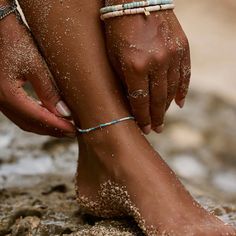 Having perfect style is no small feet—-but our Ventura Stretch Bead Anklet can help make it happen! Available in a turquoise and silver color combo, this slip-on style features delicate heshi beads that’ll have you glimmering from head to toe. Pura Vida Necklace, Anklet Silver, Midnight Red, Bead Anklet, Pura Vida Bracelets, Graphic Tee Dress, Colour Combo, Green Collection, Beaded Anklets