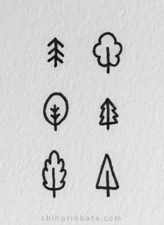 four different types of trees drawn on paper