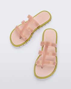 Strut your style with the Melissa Path Slide, where flip-flop ease meets slide allure. Tread boldly on the dual-color outsole while the comfy EVA insole makes every step a joy. These are your ticket to having it all: laid-back comfort and trendy style. Slide into pure perfection. Summer Jelly Slide Sandals With Non-slip Sole, Pink Slide Sandals With Buckle Closure, Non-slip Synthetic Slide Jelly Sandals, Pink Non-slip Slide Sandals, Synthetic Slip-on Slides With Buckle Closure, The Comfy, Trendy Style, Flip Flop, Ballet Flats