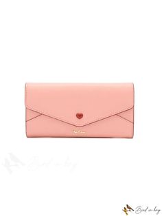 a pink wallet with a heart on it