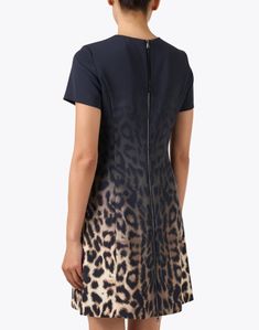 Refined and feminine with a modern edge, this dress echoes Marc Cain's design aesthetic. The shift silhouette features a leopard print overlaid with an ombre effect for a fashion-forward twist on the LBD. Wear it with black heels and a coordinating clutch for a chic and elevated new season look. The Shift, Ombre Effect, Printed Shift Dress, Design Aesthetic, Black Heels, New Season, Shift Dress, Fashion Forward, Leopard Print