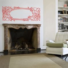 a living room with a fire place, chair and bookcase in front of the fireplace