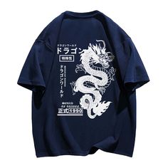 Introducing our Dragon T-Shirt, a symbol of strength and power. Crafted with high-quality materials, this shirt exudes luxury and sophistication. Its sleek design and intricate dragon motif will leave a lasting impression. Elevate your style with this exclusive piece and make a powerful statement wherever you go. Features: -100% Cotton -Crew Neckline -Dropped Shoulder -Regular fit -Unisex style Casual Cotton Tops With Dragon Design, Casual Cotton Top With Dragon Design, Casual Dragon Design Tops For Streetwear, Casual Tops With Dragon Design For Streetwear, Short Sleeve Tops With Dragon Print For Streetwear, Dragon Print Crew Neck Top For Streetwear, Cotton Short Sleeve Tops With Dragon Print, Casual Crew Neck Top With Dragon Design, Crew Neck Cotton Top With Dragon Print