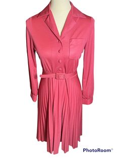 "Vintage 70s Pink Dress with Front Button Closures, Collar, and Belt. Brand: newton centre Size: Look to Measurements  Condition: Good. Some Small Stains on the Front. Measurements: Length- 41\" Sleeve Length- 28\" Bust- 38\" Waist- 30\" Hips- 60\"" Vintage Long Sleeve Pleated Midi Dress, Fitted Mid-length Shirt Dress For Fall, Retro Fitted Midi Dress With Buttons, Fitted Retro Midi Dress With Buttons, Vintage Semi-formal Spring Dress, Vintage Pink Long Sleeve Midi Dress, Retro Spring Midi Dress For Formal Occasions, Semi-formal Vintage Spring Dress, Retro Pleated Dress For Fall