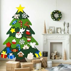 a decorated christmas tree sitting on top of a wooden floor