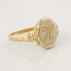 This vintage style sea-themed signet ring, featuring beautiful little shells and ocean-inspired fluorishes all around the center which displays your personal monogram or initials.  This ring can be customized with any letter or word (provided it fits) and is made in solid gold. This ring can be made for men or women and in your preferred size or color of gold. A phrase or letter may be written on the inside, too! All designs are modelled and sent to you for approval before casting the final desi Monogram Signet Ring, Woman Signet Ring, Signet Ring Initials, Signet Rings Women Vintage, Signet Ring Vintage, Gold Rings For Men, Signet Ring Women, Graduation Ring, Lily Ring