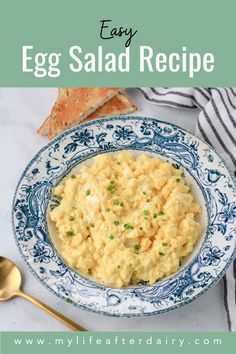 an egg salad in a blue and white bowl