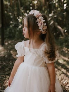 Elevate her look with this stunning flower crown, featuring champagne blush and ivory blooms accented by delicate greenery. Perfect for weddings, birthdays, or special occasions, this adjustable tie-back design with an ivory ribbon fits toddlers to adults. A timeless accessory for every magical moment! Theme Bapteme, Champagne Flower Girl, Flower Girl Dresses Champagne, Baby Flower Crown, Champagne Flowers, Whimsical Flower, Floral Comb, Ivory Flower Girl Dresses