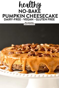 healthy no - bake pumpkin cheesecake on a white plate with caramel drizzle