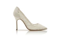 a white high heeled shoe with an intricate lace design on the bottom and side