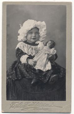 Outstanding Antique Victorian Photo, Girl in Bonnet holding large Porcelain Doll Bette Davis, Old Dolls