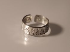 This Stackable Rings item by VeeaienDesigns has 34 favorites from Etsy shoppers. Ships from Farmingdale, NY. Listed on Aug 3, 2023 Nature-inspired Etched Rings Ideal For Gifts, Stamped Ring, Hand Stamped Ring, Cedar Tree, Tree Ring, Stamped Rings, Cedar Trees, Tree Rings, Evergreen Trees