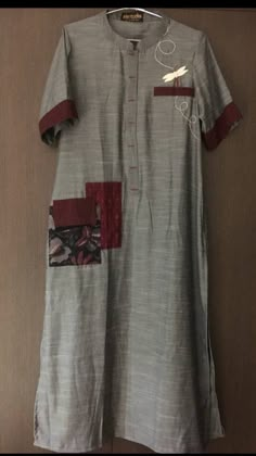 Linen-cotton kurti with patches detailing Kurtis With Pockets Style, Patch Kurti Design, Pocket Style Kurti Design, Pocket Kurti Design, Cotton Kurties, Plain Kurti Designs, Sukienki Maksi, Plain Kurti, Indian Kurti Designs