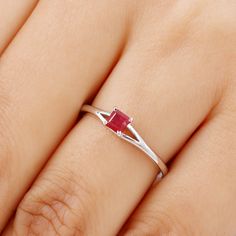 Product Details Crafted with a flair of elegance, this Split Shank makes for an aesthetic choice for the special day of your life. Adorned with round shape Ruby Solitaire in French Setting for a luxurious appeal. Product Information SKU SHP-RINGS0821151102 Width 4.5 mm Height 4 mm Weight 1.36 gm (Approximate) RUBY INFORMATION No.of Stones 1 Pieces Total Weight 0.45 Carat (Approximate) Dimension(approx) Princess Cut-4X4 mm-1 Pcs Color Red Cut Brilliant Shape Princess Cut Setting Type Prong-Setting Quality Grade AAA View More Product Parent Collection Handle ruby-rings Ruby Promise Ring, Dainty Promise Ring, Ruby Solitaire Ring, Ring Princess Cut, Red Gemstone Ring, July Birthstone Ring, Promise Rings For Her, Red Gemstones, Star Ruby