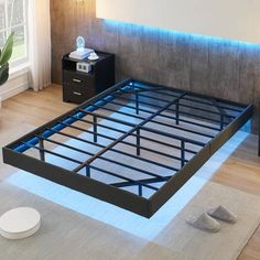 a bed that is sitting in the middle of a room with no sheets on it