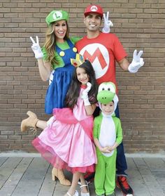 a family dressed up as mario and luigi