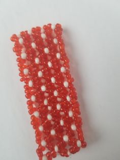 The bracelets are beautifully handcrafted with beads on an elastic string. Thanks for shopping with us and come again. Stay safe https://www.etsy.com/shop/naistumityujewelry Handmade White Wristlet With Round Beads, Handmade Stretch Bracelet With Round Beads, Lock Style, Beaded Collar, Unisex Bracelets, African Beads, Green Item, Seed Bead Jewelry, Red Gold