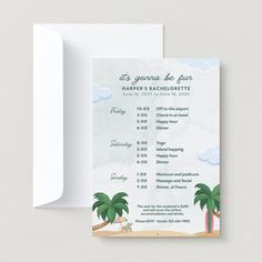 a card with a palm tree and beach scene on it, next to an envelope