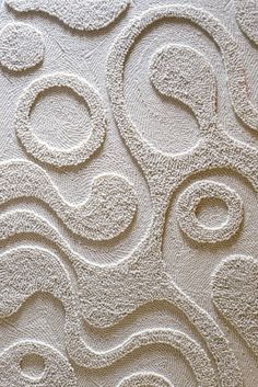 an abstract wallpaper design with wavy lines and swirls on the surface, in white