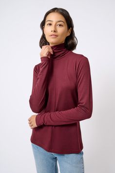 For all you non-wool lovers, we found the finest of Italian brushed jerseys to create this new essential for your Fall wardrobe. With a center front and center back seam, this style has a long turtleneck and long sleeve for extra gathering, the perfect Length for easy layering, and soft hand finish to make it your favorite.ESTIMATED DELIVERY 8/15/22 Center front and center back seams, long turtleneck with clean finish, longer sleeve length. - 83% Polyester, 14% Viscose, 3% Elastin - Fabric woven Winter Fine Knit Mock Neck Top, Winter Fine Knit High Neck Mock Neck Top, Fall Mock Neck Long Sleeve Top In Fine Knit, Fall Mock Neck Long Sleeve Fine Knit Top, Fall Fine Knit Long Sleeve Mock Neck Top, Solid Color Turtleneck Long Sleeve Top For Work, Solid Turtleneck Long Sleeve Top For Work, Solid Turtleneck For Fall Layering, Classic Soft Knit Long Sleeve Turtleneck