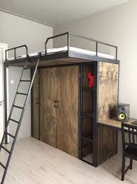 there is a loft bed with a desk and chair in the room next to it