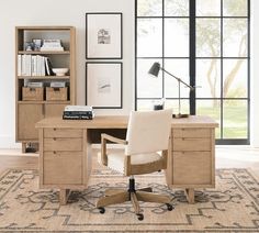 an office with a desk, chair and bookshelf in front of a window