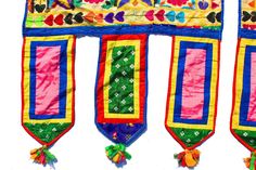 "Item Description L-Shaped India Gujarat Kutch Rabari handmade embroidered hanging known as sankbia,of the kanbi farming caste, Amreli district, Saurashtra. They are used to decorate doorways especially at wedding festivities. Antique Vintage Exquisite Banjara hand Embroidered with extensive mirror work. Indian Toran / Valence / Window or Door Topper / Wall Hanging Tapestry from the Kutch region of Gujarat in Western India. This hand embroidered Toran is guaranteed to bring you lots of complimen Multicolor Embroidered Traditional Wear For Celebration, Festive Multicolor Embroidered Fabric With Border, Bohemian Embroidered Fabric For Diwali Celebration, Bohemian Multicolor Embroidered Fabric, Festive Traditional Wear With Multicolor Embroidered Border, Festive Multicolor Traditional Wear With Embroidered Border, Embroidered Fabric For Navratri Celebration, Multicolor Embroidered Fabric With Border For Festivals, Embroidered Multicolor Choli For Navratri