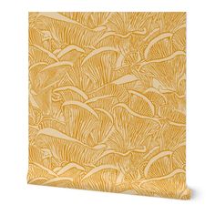 an orange and yellow wallpaper with large leaves on the bottom, in front of a white background