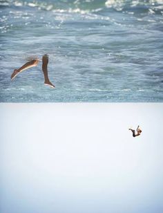 two birds are flying over the ocean water