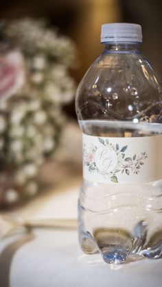 a bottle of water sitting on top of a table