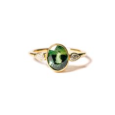 The color in this ring not only twinkles with luxury but with adventure. With a brilliant cut 2.5ct oval that exudes a deep, magnificent green and two white pear diamonds on both sides, each with an si2 coloring GHI, this is the ultimate trio set ... Vintage Green Engagement Rings, Bezel Engagement Ring Sapphire, Unique Bezel Settings, Green Engagement Ring, Green Engagement Rings, Sapphire Diamond Engagement Ring, Green Sapphire Engagement, Green Sapphire Engagement Ring, Diamond Sapphire Engagement Ring